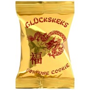 golden glänzende Glückskeks-Verpackung mit rotem Drachen-Motiv